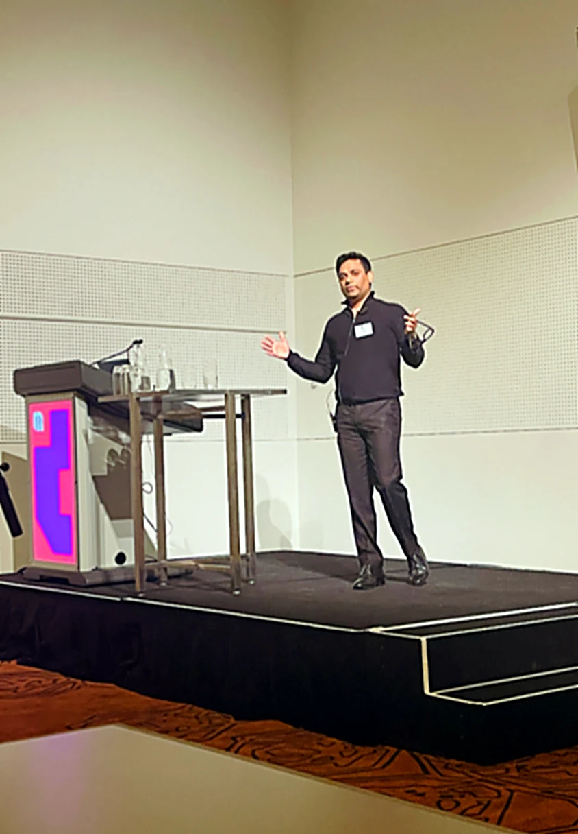 Sujit presenting the Fonterra use case on stage